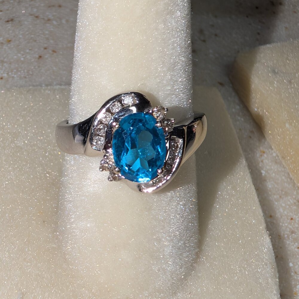 Brilliant Blue Oval Gemstone Ring with Pavé Accents